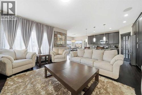 65 Elgin Meadows Circle Se, Calgary, AB - Indoor Photo Showing Living Room