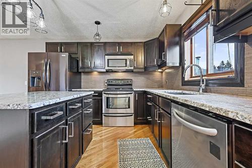 128 Ventura Way Ne, Calgary, AB - Indoor Photo Showing Kitchen With Stainless Steel Kitchen With Upgraded Kitchen