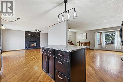 128 Ventura Way Ne, Calgary, AB - Indoor With Fireplace