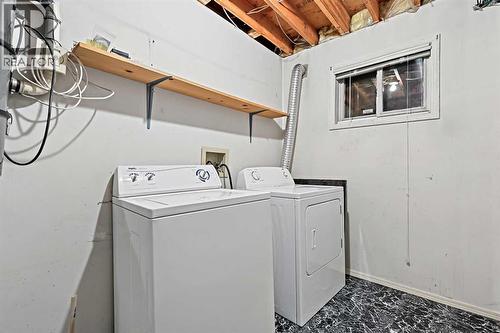 128 Ventura Way Ne, Calgary, AB - Indoor Photo Showing Laundry Room