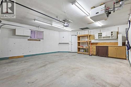 128 Ventura Way Ne, Calgary, AB - Indoor Photo Showing Garage
