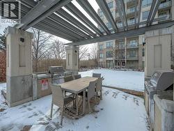 Courtyard with BBQ's and patio - 