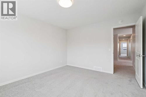 28 Calhoun Rise Ne, Calgary, AB - Indoor Photo Showing Other Room