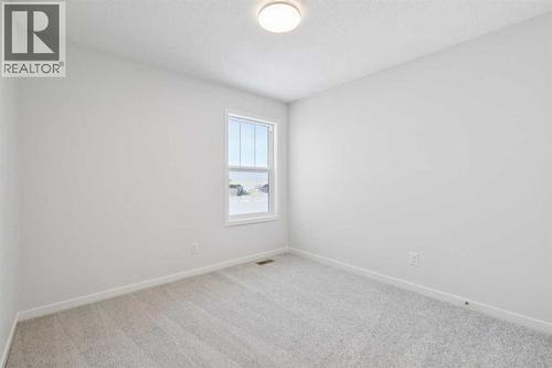 28 Calhoun Rise Ne, Calgary, AB - Indoor Photo Showing Other Room