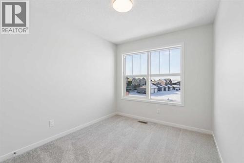 28 Calhoun Rise Ne, Calgary, AB - Indoor Photo Showing Other Room