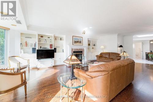 307 - 85 Wellington Street W, Aurora, ON - Indoor Photo Showing Living Room With Fireplace