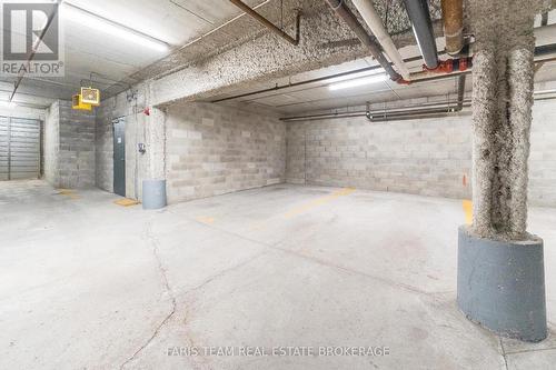 307 - 85 Wellington Street W, Aurora, ON - Indoor Photo Showing Garage