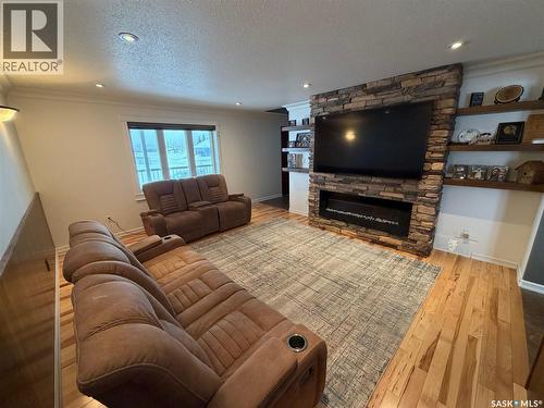 501 Silver Place, Hudson Bay, SK - Indoor Photo Showing Living Room With Fireplace