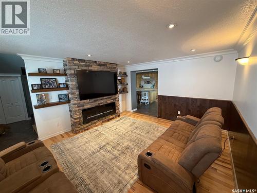 501 Silver Place, Hudson Bay, SK - Indoor Photo Showing Living Room With Fireplace