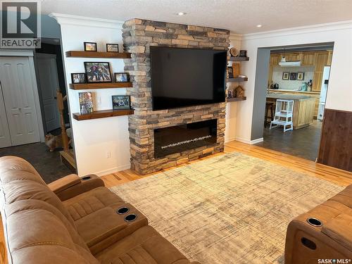 501 Silver Place, Hudson Bay, SK - Indoor Photo Showing Living Room With Fireplace