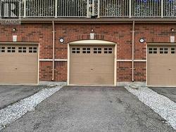 Summer Image of Garage & Driveway - 