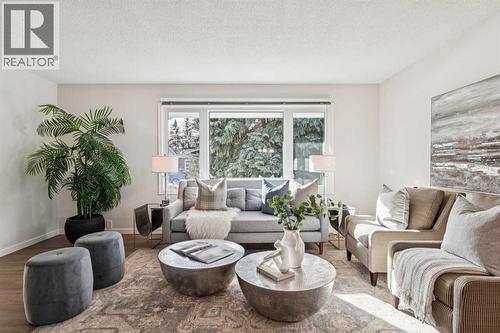 195 Lake Adams Crescent Se, Calgary, AB - Indoor Photo Showing Living Room