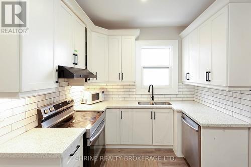 480 Quebec Street, London East (East G), ON - Indoor Photo Showing Kitchen With Double Sink