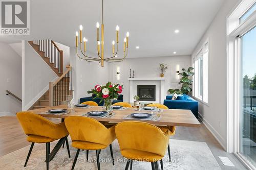 148 Aubrais Crescent, Ottawa, ON - Indoor Photo Showing Dining Room With Fireplace