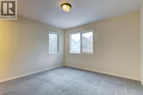 4, 704 8Th Avenue, Canmore, AB - Indoor Photo Showing Other Room