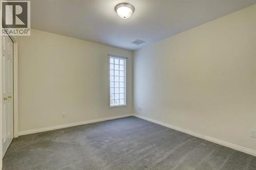 4, 704 8Th Avenue, Canmore, AB - Indoor Photo Showing Other Room