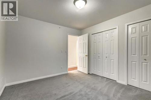 4, 704 8Th Avenue, Canmore, AB - Indoor Photo Showing Other Room