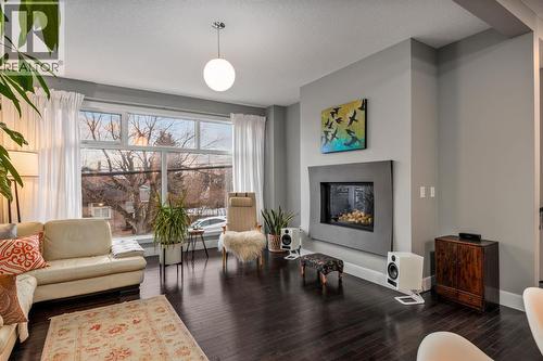 2915 17 Street Sw, Calgary, AB - Indoor Photo Showing Living Room With Fireplace