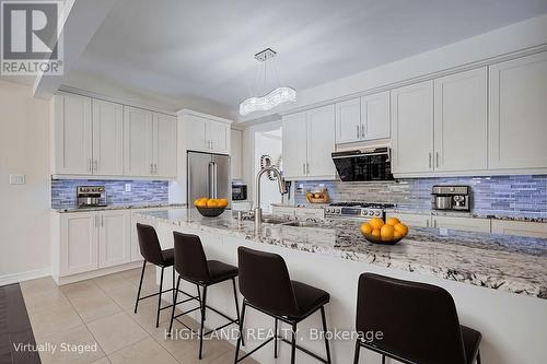 1569 Eglinton Avenue W, Mississauga, ON - Indoor Photo Showing Kitchen With Upgraded Kitchen