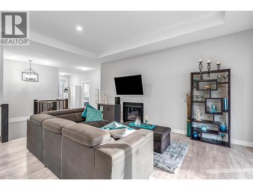 3445 Jackson Avenue, Armstrong, BC - Indoor Photo Showing Living Room With Fireplace