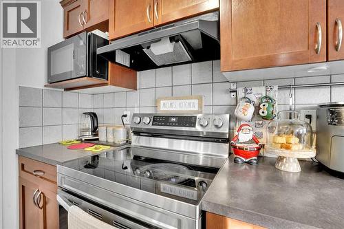 73 Covebrook Place Ne, Calgary, AB - Indoor Photo Showing Kitchen With Stainless Steel Kitchen