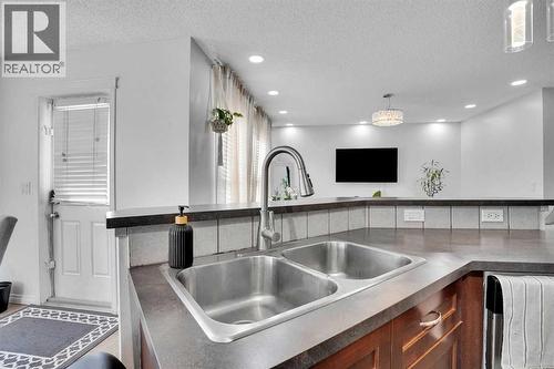 73 Covebrook Place Ne, Calgary, AB - Indoor Photo Showing Kitchen With Double Sink