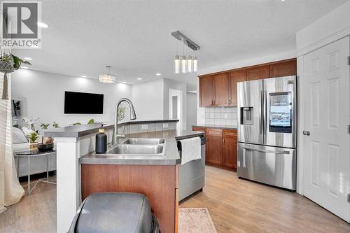 73 Covebrook Place Ne, Calgary, AB - Indoor Photo Showing Kitchen With Stainless Steel Kitchen With Double Sink