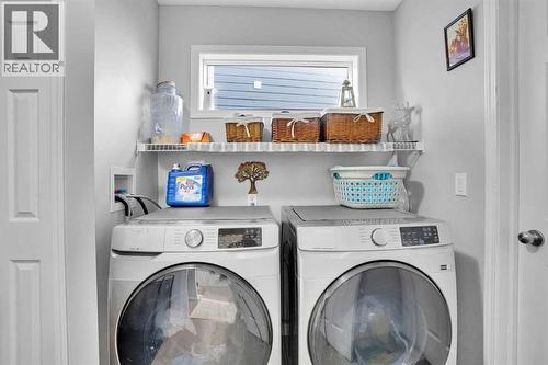 73 Covebrook Place Ne, Calgary, AB - Indoor Photo Showing Laundry Room