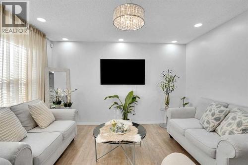 73 Covebrook Place Ne, Calgary, AB - Indoor Photo Showing Living Room