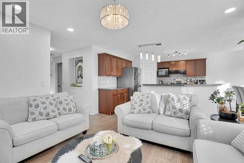 73 Covebrook Place Ne, Calgary, AB - Indoor Photo Showing Living Room