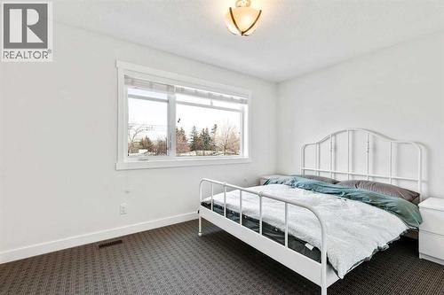 2728 Cochrane Road Nw, Calgary, AB - Indoor Photo Showing Bedroom