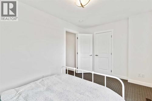 2728 Cochrane Road Nw, Calgary, AB - Indoor Photo Showing Bedroom
