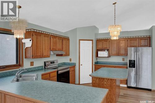4154 Wascana Ridge Place, Regina, SK - Indoor Photo Showing Kitchen With Double Sink