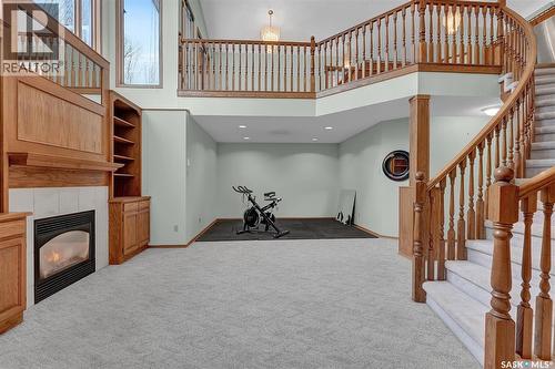 4154 Wascana Ridge Place, Regina, SK - Indoor Photo Showing Other Room With Fireplace