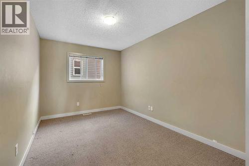 135 Panatella Close Nw, Calgary, AB - Indoor Photo Showing Other Room