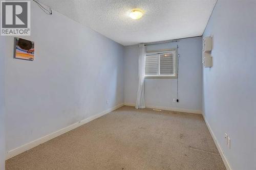 135 Panatella Close Nw, Calgary, AB - Indoor Photo Showing Other Room