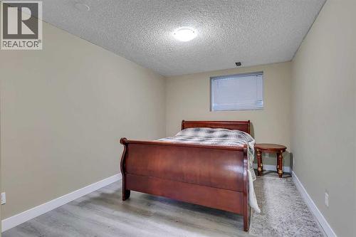 135 Panatella Close Nw, Calgary, AB - Indoor Photo Showing Bedroom