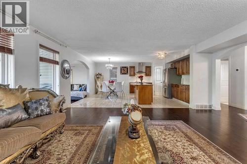 135 Panatella Close Nw, Calgary, AB - Indoor Photo Showing Living Room