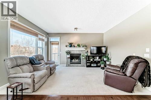 172 Seagreen Way, Chestermere, AB - Indoor Photo Showing Living Room With Fireplace