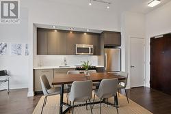 Kitchen / Eat-in Area (Virtually Staged) - 
