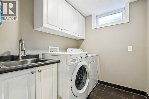 1507 Cayuga Drive Nw, Calgary, AB - Indoor Photo Showing Laundry Room