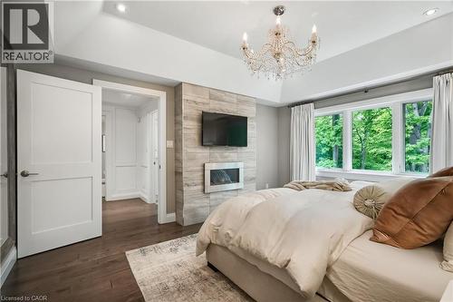 61 Oak Knoll Drive, Hamilton, ON - Indoor Photo Showing Bedroom With Fireplace