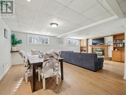 Basement - Living/Dining Room w/ gas fireplace - 