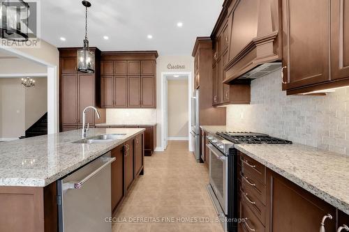 31 Munsie Drive, King, ON - Indoor Photo Showing Kitchen With Double Sink With Upgraded Kitchen