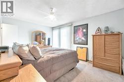 Primary with ceiling fan and big window! - 