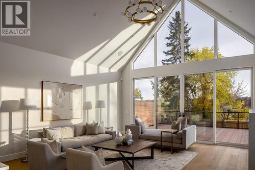 Vaulted Ceiling in Great Room connecting to West-facing Deck - 2920 Toronto Crescent Nw, Calgary, AB - Indoor Photo Showing Living Room