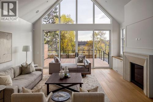 Sweeping Park Views and Gas Fireplace - 2920 Toronto Crescent Nw, Calgary, AB - Indoor Photo Showing Living Room