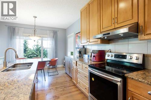 62 Panamount Road Nw, Calgary, AB - Indoor Photo Showing Kitchen With Double Sink