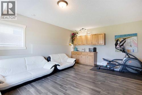62 Panamount Road Nw, Calgary, AB - Indoor Photo Showing Gym Room