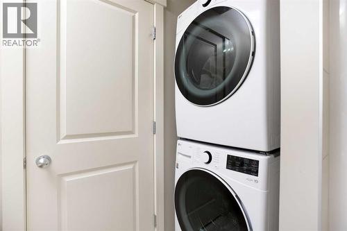 62 Panamount Road Nw, Calgary, AB - Indoor Photo Showing Laundry Room